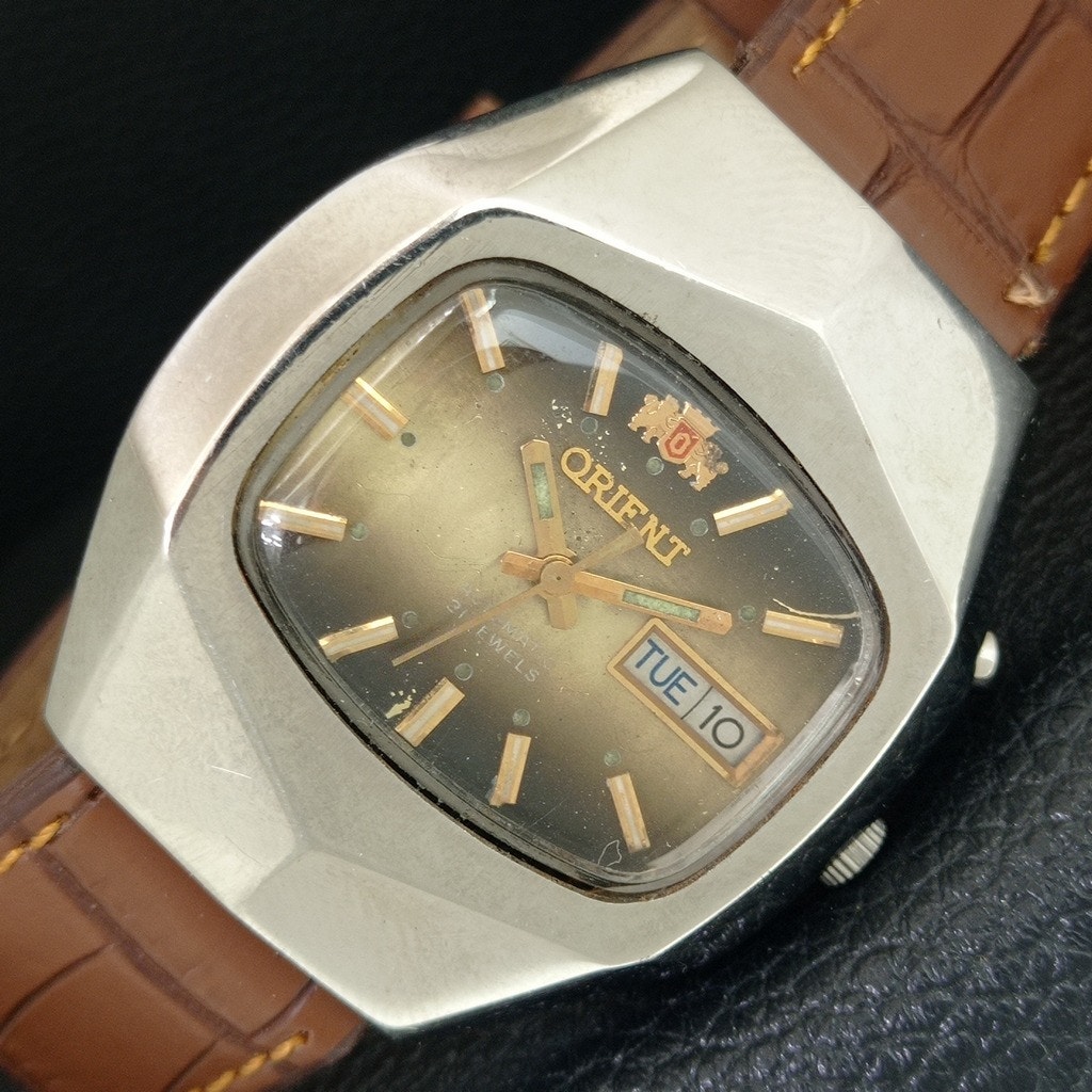 Vintage 1983 Orient Automatic Mens Silver Watch WDaydate  Gold Accents
